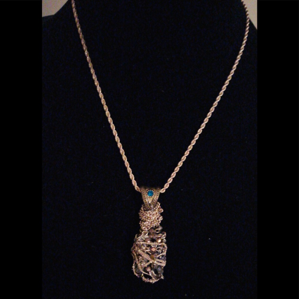 Simulated Wrapped Gold Cluster with a Rope Chain
